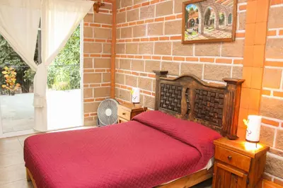 Cama o camas de una habitación en Hospedaje Piedra de Sol