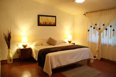 Cama o camas de una habitación en Hotel Quinta del Sol