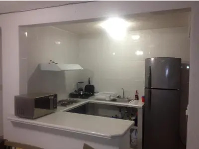 Una cocina o zona de cocina en Deep Ocean Acapulco