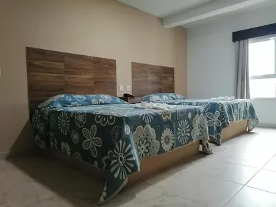 Cama o camas de una habitación en Hotel Las Vias
