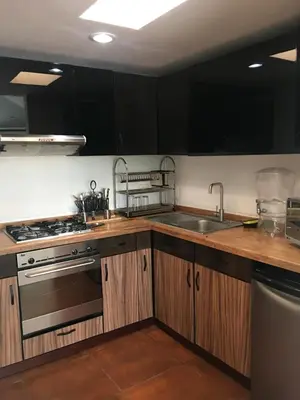 Una cocina o zona de cocina en Finca el Nogal - Casa Entera Familiar Moderna con Amplio Jardín Atlixco puebla