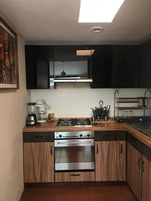 Una cocina o zona de cocina en Finca el Nogal - Casa Entera Familiar Moderna con Amplio Jardín Atlixco puebla