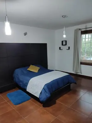Cama o camas de una habitación en Finca el Nogal - Casa Entera Familiar Moderna con Amplio Jardín Atlixco puebla