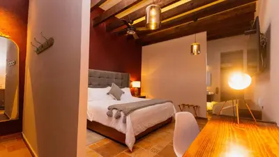 Cama o camas de una habitación en Casa Eva Hotel Boutique & Spa