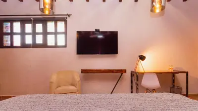 Una televisión o centro de entretenimiento en Casa Eva Hotel Boutique & Spa