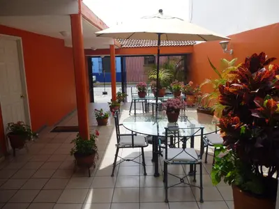 Un restaurante o sitio para comer en Hotel Camba