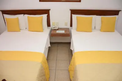Cama o camas de una habitación en Hotel Camba
