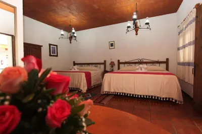 Cama o camas de una habitación en Parador Monte Carmelo