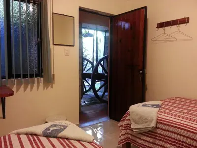 Cama o camas de una habitación en Hotel Casa Arnel