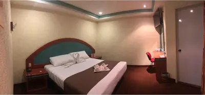 Cama o camas de una habitación en HOTEL ORION