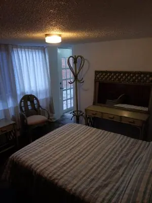 Cama o camas de una habitación en Casa de Irma para visitar la ciudad o de negocios