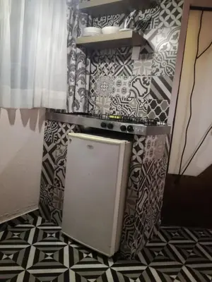 Una cocina o zona de cocina en Suites Viveros Coyoacán I Hospedaje a tu medida