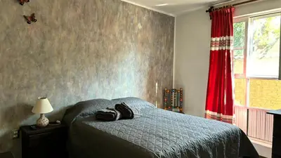 Cama o camas de una habitación en Casa los Arcos Oaxaca