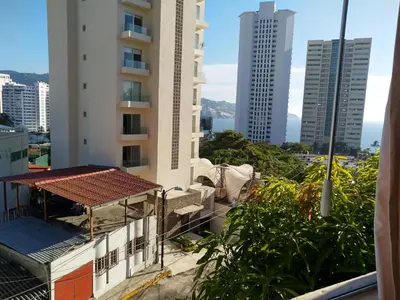 Edificio en el que se encuentra la habitación en casa particular