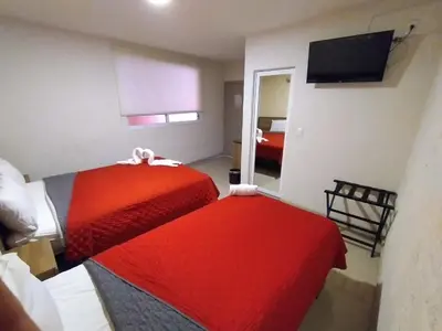 Cama o camas de una habitación en HOTEL SAN JOSE