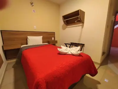 Cama o camas de una habitación en HOTEL SAN JOSE