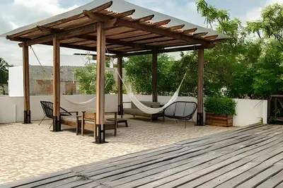 Un patio o zona al aire libre en La Aurora Puerto Escondido