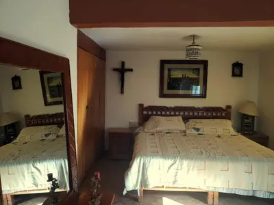 Cama o camas de una habitación en Casa Vista Taxco