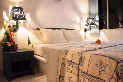 Cama o camas de una habitación en Coral Clubes Acapulco