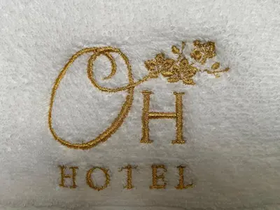 Certificado, premio, señal o documento que está expuesto en Hotel Orquídea