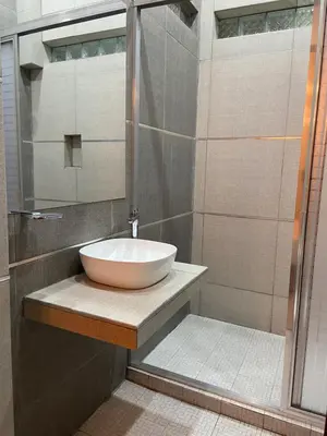 Un baño de Hotel Orquídea