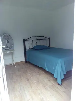 Cama o camas de una habitación en Experiencia Teques