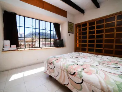 Cama o camas de una habitación en Casa de las Cruces Taxco