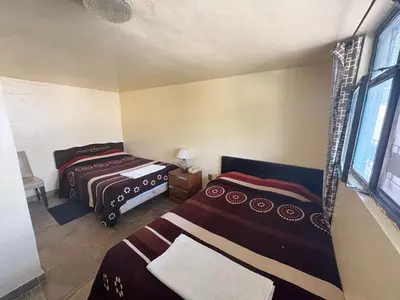 Cama o camas de una habitación en Hotel Zaragoza