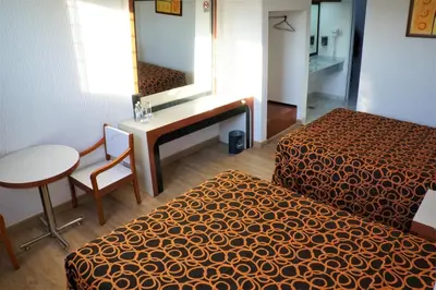 Cama o camas de una habitación en Hotel Princesa