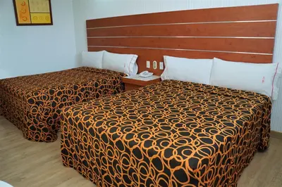 Cama o camas de una habitación en Hotel Princesa