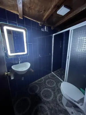 Un baño de MANDALA CAMP