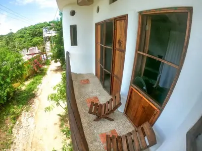 Un balcón o terraza de Departamentos Éxodo