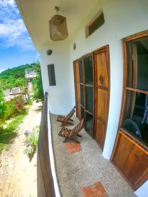 Un balcón o terraza de Departamentos Éxodo