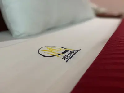Cama o camas de una habitación en HOTEL MARIA RICO