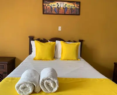 Cama o camas de una habitación en Hotel Muñoz de Luna