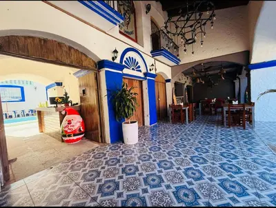 Un restaurante o sitio para comer en Hotel OM Tangolunda
