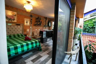 Zona de estar de Barro Negro by Majikal B&B
