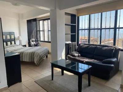 Cama o camas de una habitación en Casa Vista hermosa de taxco