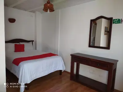Cama o camas de una habitación en Hotel Montecarlo