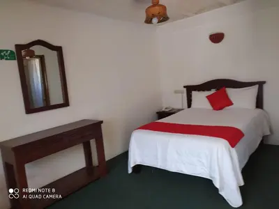 Cama o camas de una habitación en Hotel Montecarlo