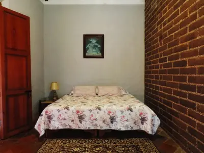 Cama o camas de una habitación en Antigua Hacienda Metepec