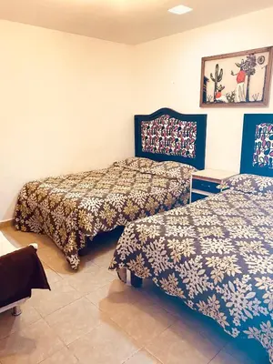 Cama o camas de una habitación en Departamento equipado con Terraza en Zacatlán, 10 pax