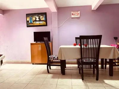 Una televisión o centro de entretenimiento en Departamento equipado con Terraza en Zacatlán, 10 pax