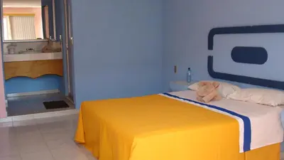 Cama o camas de una habitación en Posada San José, Hotel
