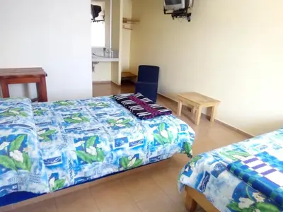 Cama o camas de una habitación en Posada San José, Hotel