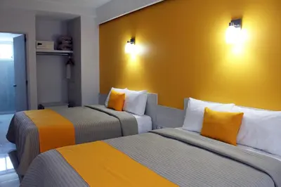 Cama o camas de una habitación en SC HOTEL