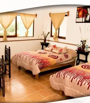 Cama o camas de una habitación en Posada Acaxiloco