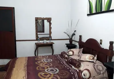 Cama o camas de una habitación en Posada Acaxiloco