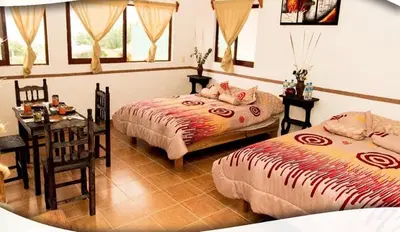 Cama o camas de una habitación en Posada Acaxiloco