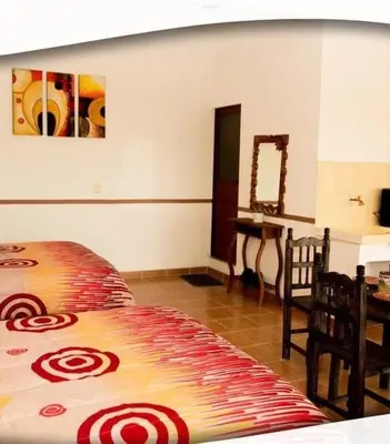 Cama o camas de una habitación en Posada Acaxiloco